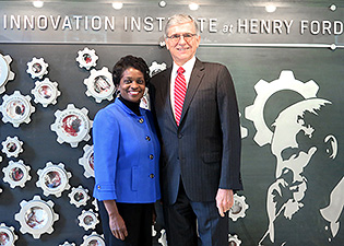 Photo of  Chairman Tom Wheeler and Commissioner Mignon Clyburn