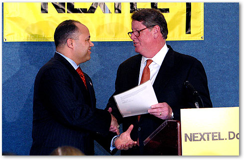 Chairman Powell and Nextel CEO Timothy Donahue.